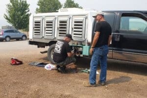 Working on Rescue Ranch animal transport vehicle generator during McKinney Fire