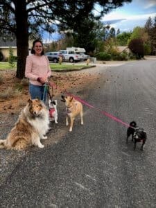 Alicarmen with Zoie, now Rosie, and family dogs on walk