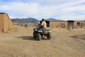 Pocket pittie, Ramona and John leaving on ATV