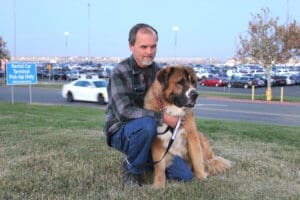 Rescue Ranch this year, Rick with Thor wiaitng for adopters