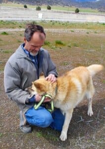 Heartworm treatment, happy, affectionate Robbie nuzzling Rick Formanek