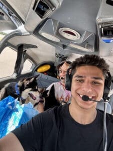 Air Transport, Isslaam in pilot's seat with Isaac and dogs in back