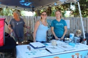 Hero Tails Animal Sanctuary Team at Red Dog Pet Supply Puppy Pool and Adoption Event