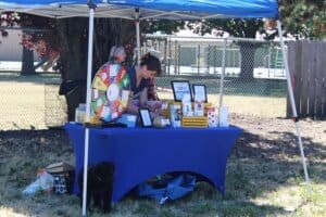 Skyler Lynch at Top Dog Table, Red Dog Pet Supply Puppy Pool and Adoption Event