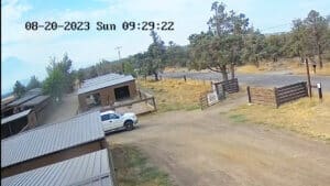 Sequence of John Golay's white truck going through the gate and leaving Sanctuary in the morning