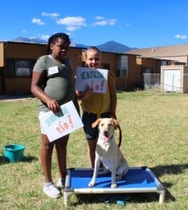 Dog socialization training camp_Nevaeh and Kaylyn with Rio