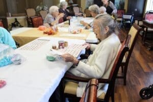 Bingo Betty at the table ready to play