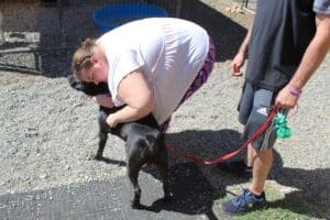 Right home, Onyx getting a hug from Jennifer his adopter