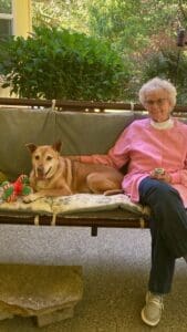 Older dog, Annie with adopter