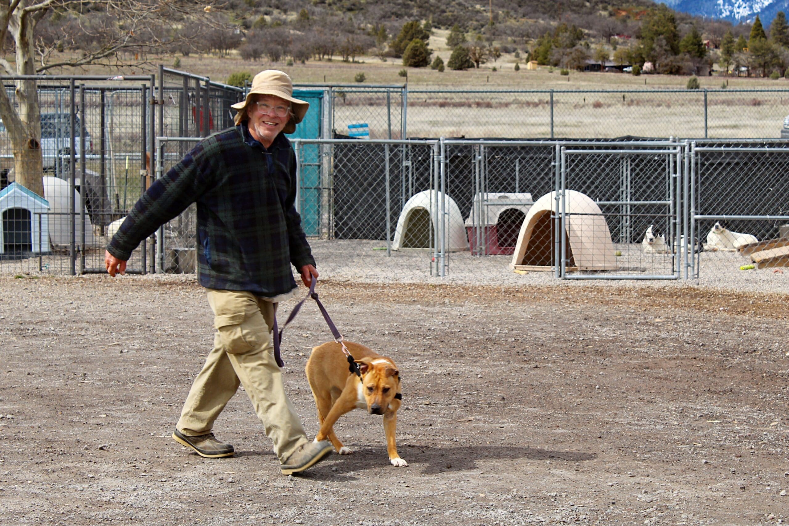 Rescue Ranch Adoption Center, volunteer walking dog